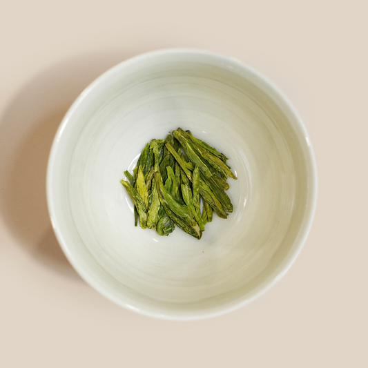 Dragon Well Green tea dry tea leaves close-up