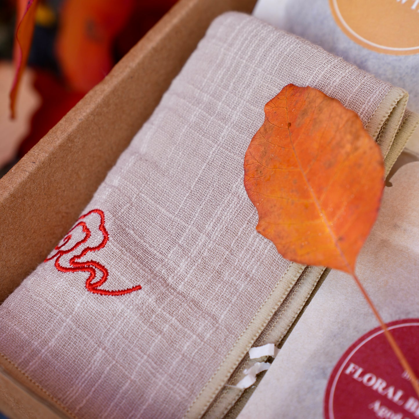 Brew & Blossom tea towel in gift box with embroidered detail and autumn leaf
