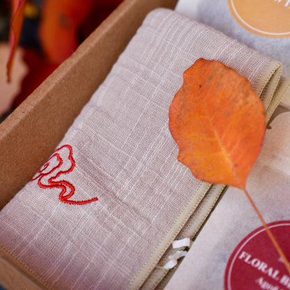 Brew & Blossom tea towel in gift box with embroidered detail and autumn leaf