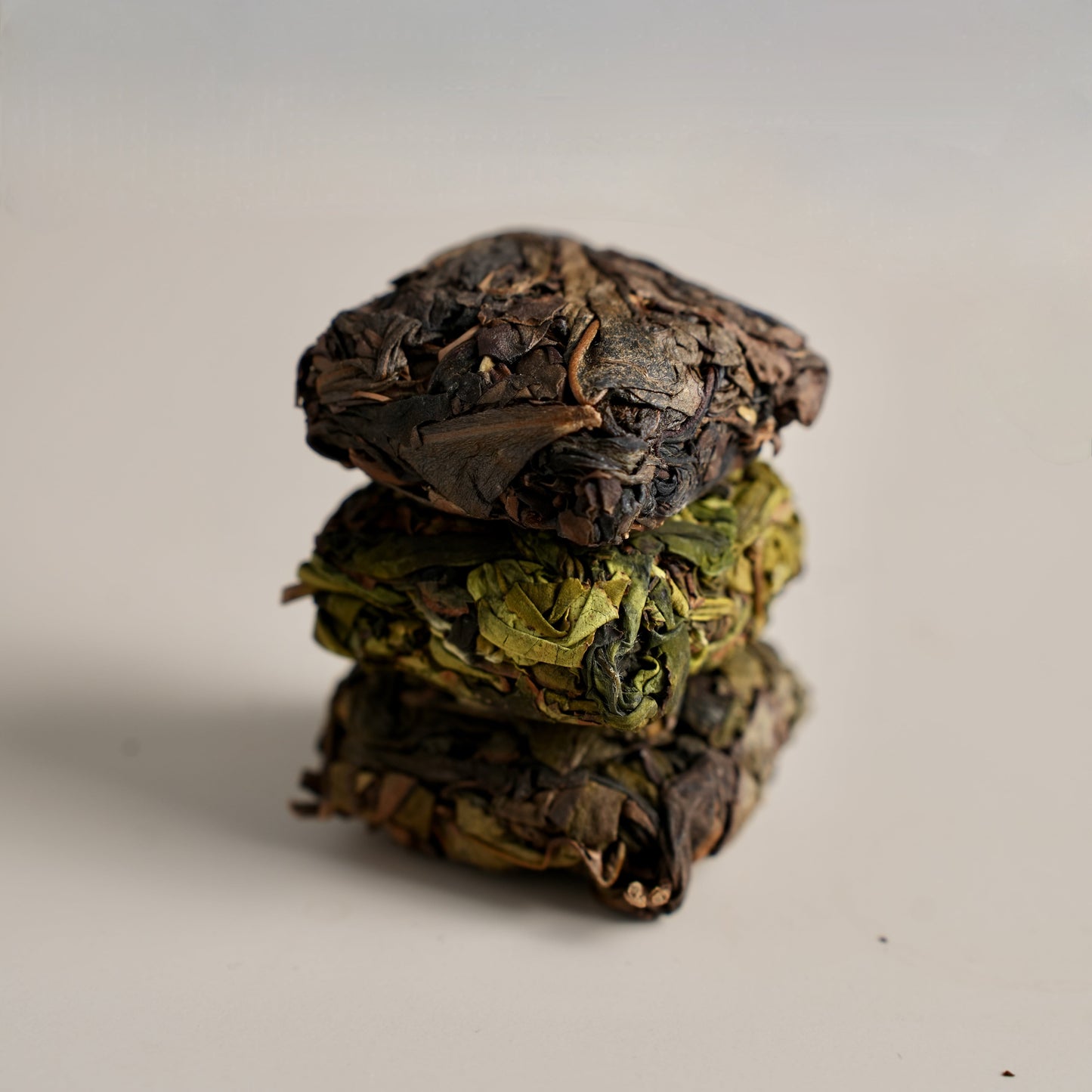 Traditional Zhangping Shuixian compressed oolong tea in signature square bricks