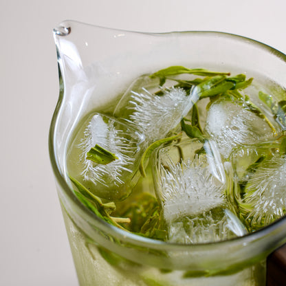Baojing Golden Green loose-leaf tea brewed cold with ice for a smooth summer tea